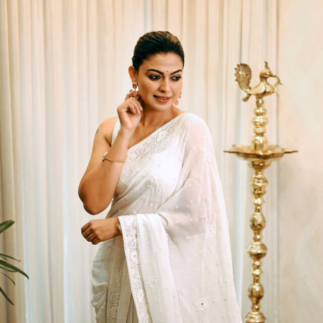 Anusree looks fairy wearing a White Embroidered Saree
