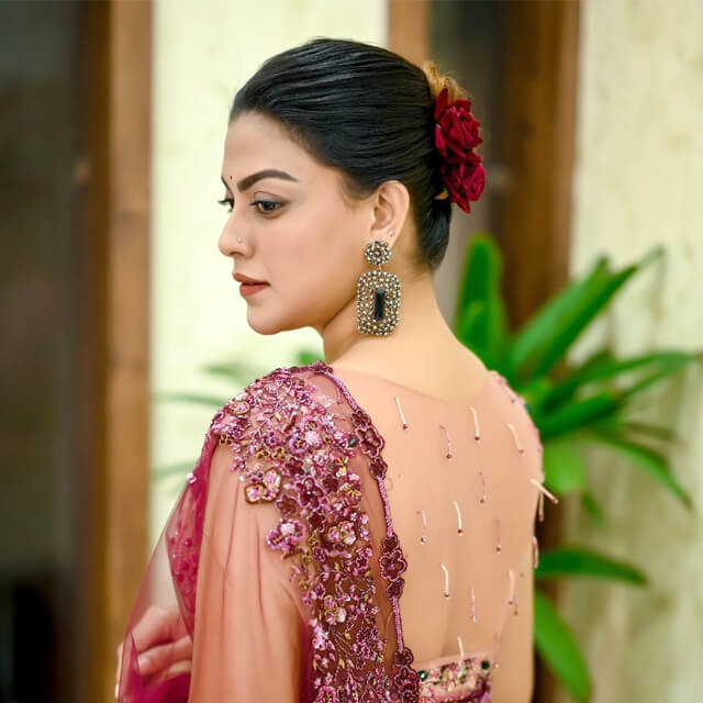 Anusree creates a Fashion Statement in a Red Saree