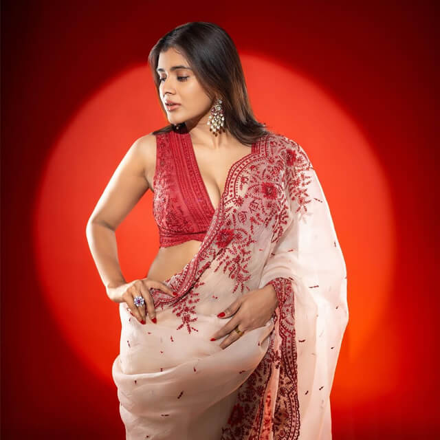 Hebah Patel grabs everyone's attention with a White & Red Floral Saree