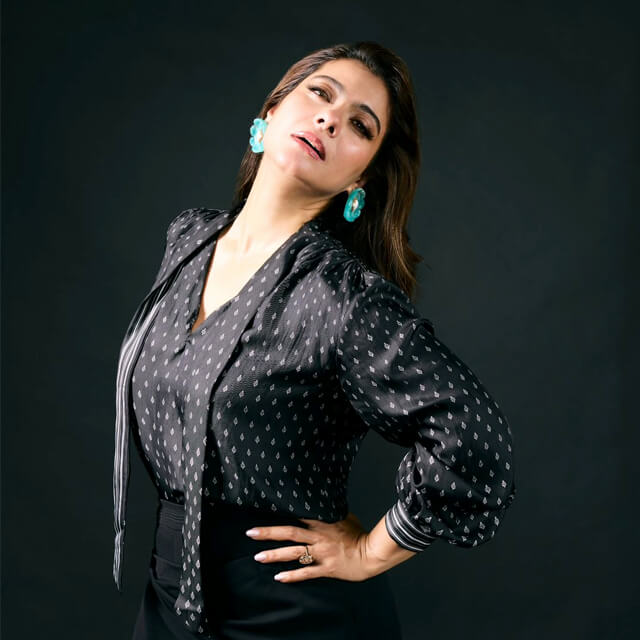 Kajol poses in Shantnu Nikhil's Printed Black Top & Skirt