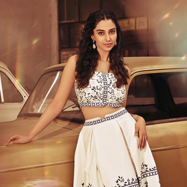 Meenakshi Chaudhary adorns an elegant White Monochrome Co-ord Set