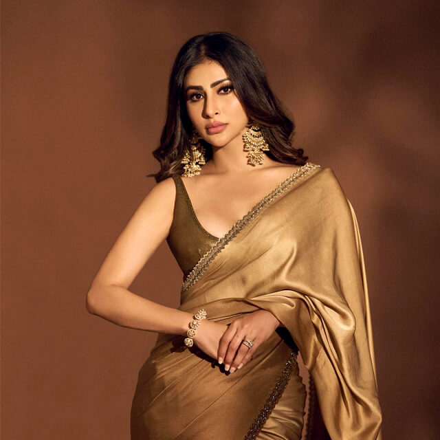 Mouni Roy flaunts in Golden Ombre Saree