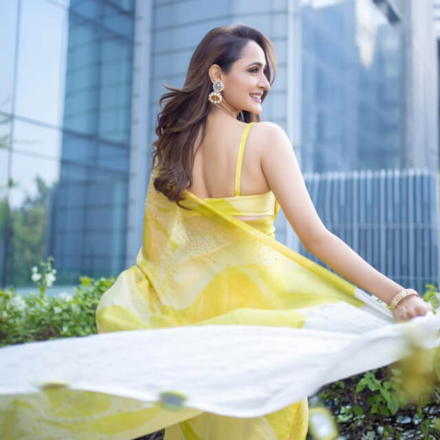 Pragya Jaiswal Radiates Elegance in a Stunning Yellow Sequin Saree