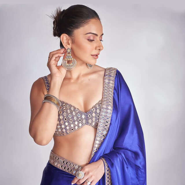 Rakul Preet sparkles in a striking Blue Saree with Mirror Bralette