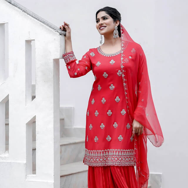 Swaswika shines in a Traditional Red Outfit for Eid Celebration