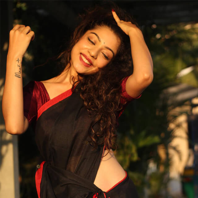 Varsha's Bold & Beautiful Black Saree Look