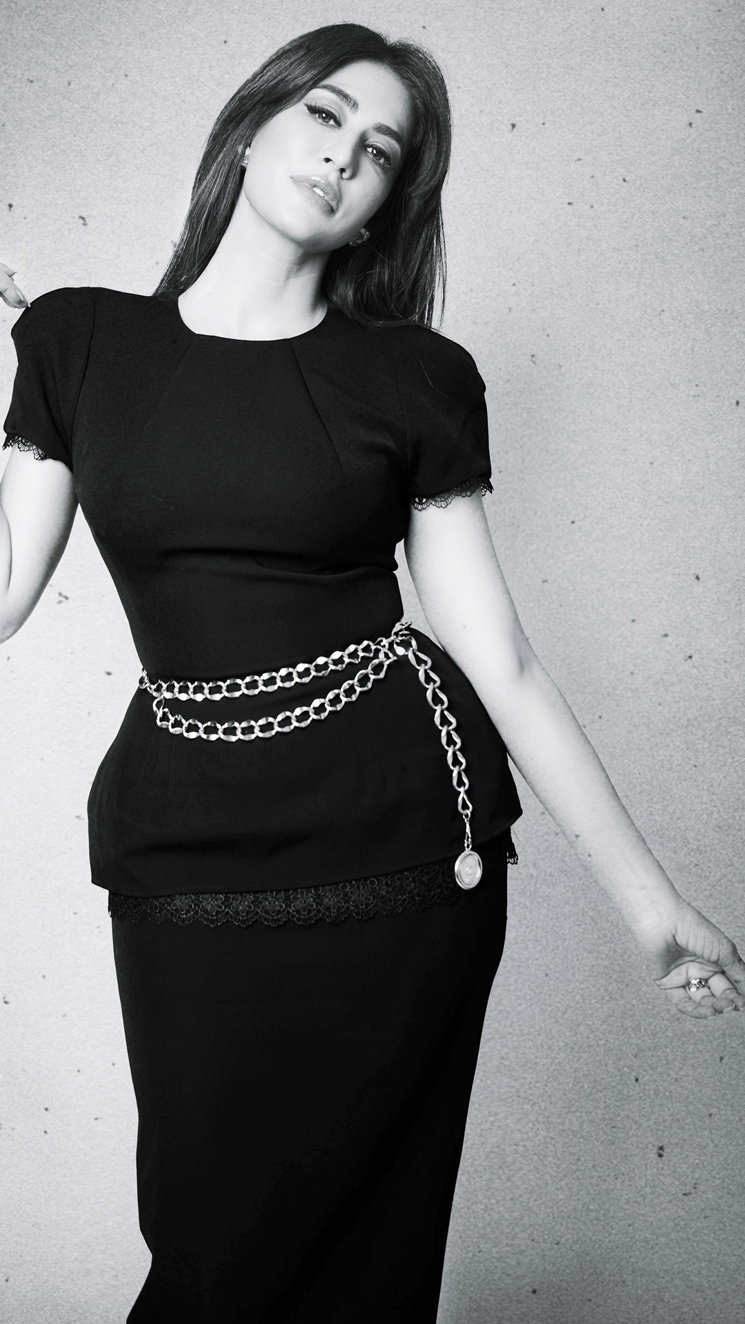 Chitrangada Singh's Recent Photoshoot - A Viange chain belt sits low across the waist and hip, introducing shine, movement and a defined horizontal line to the outfit.