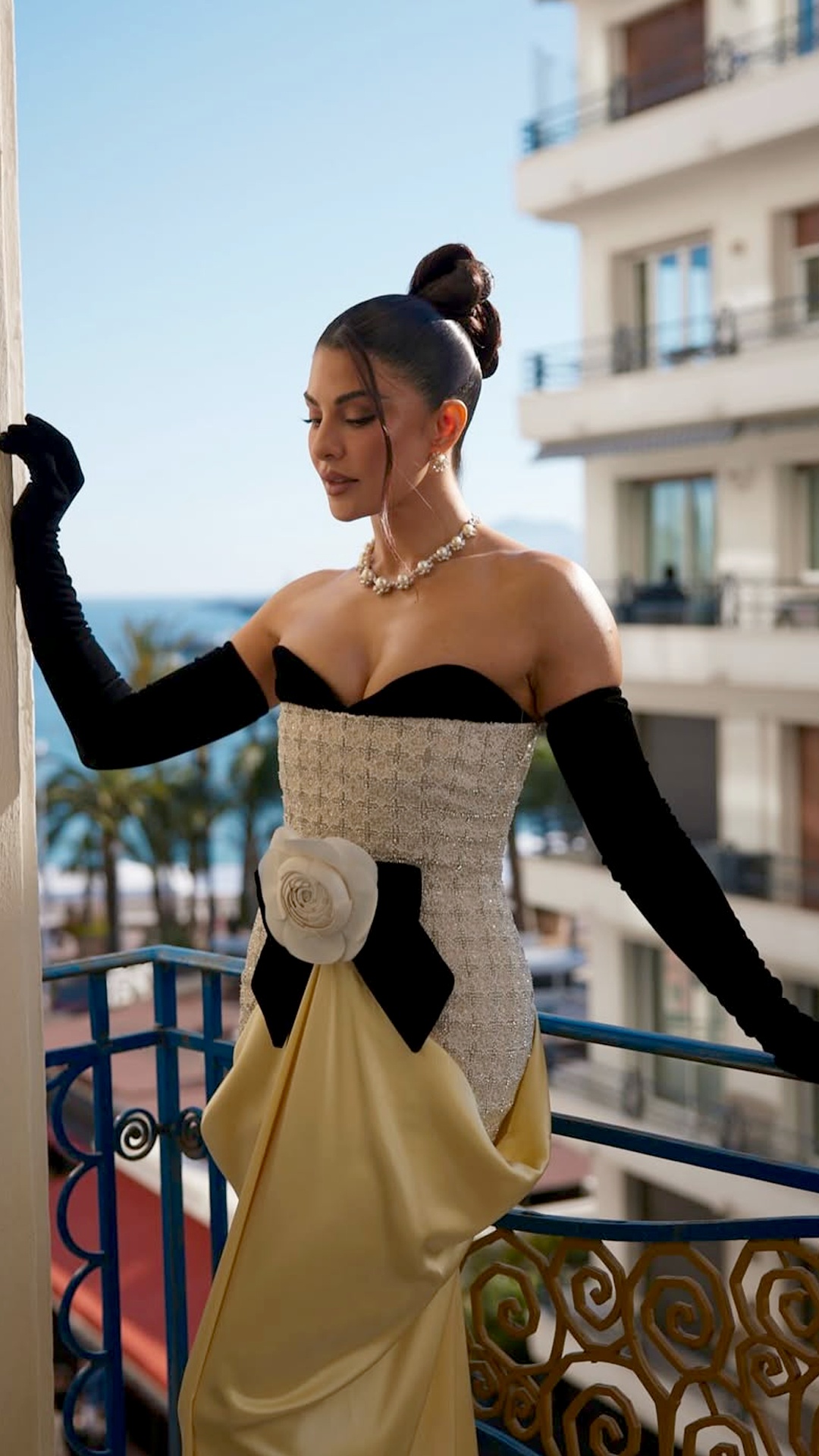 Jacqueline Fernandez's Recent Photoshoot - These black, detached opera gloves reach above the elbow. The slim fit and stretch velvet texture give off total classic Hollywood vibes.