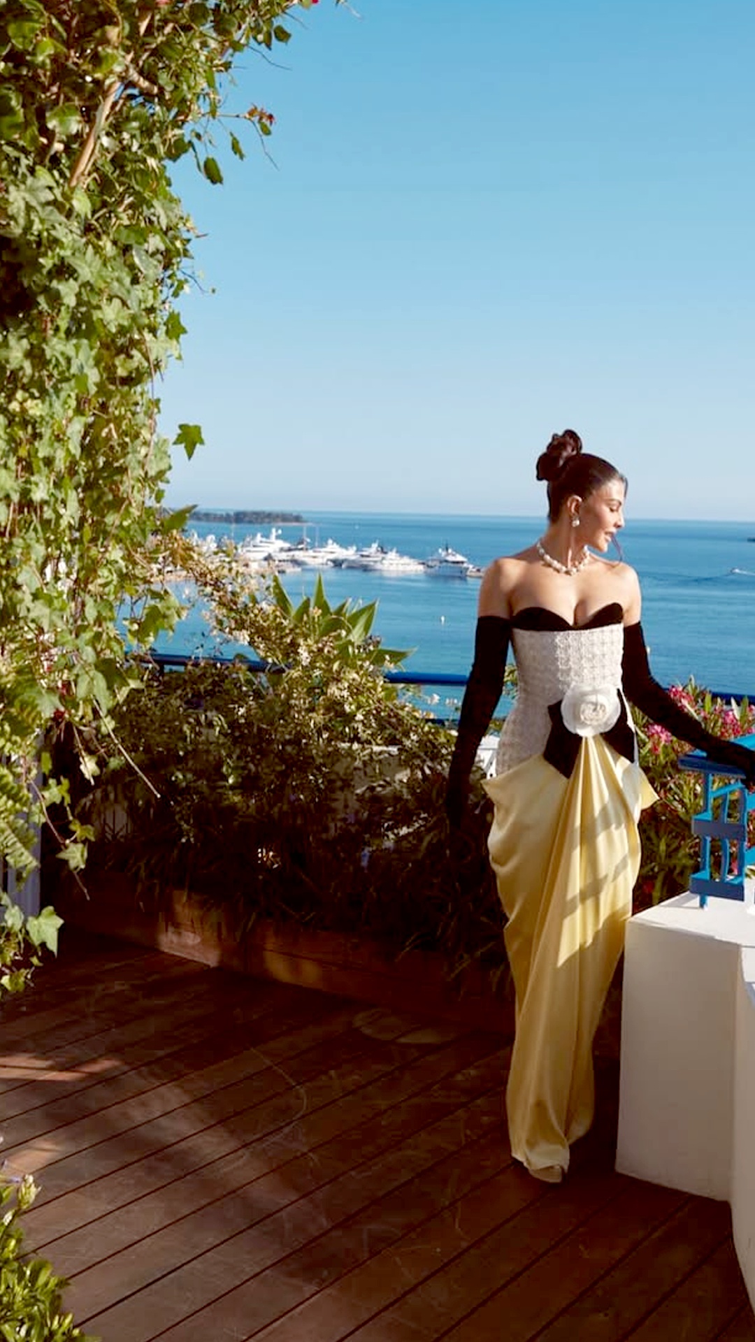 Jacqueline Fernandez's Recent Photoshoot - Captured by Dirk Alexander, the high-contrast editorial lighting mixes natural daylight with warm indoor tones for a dramatic couture feel.