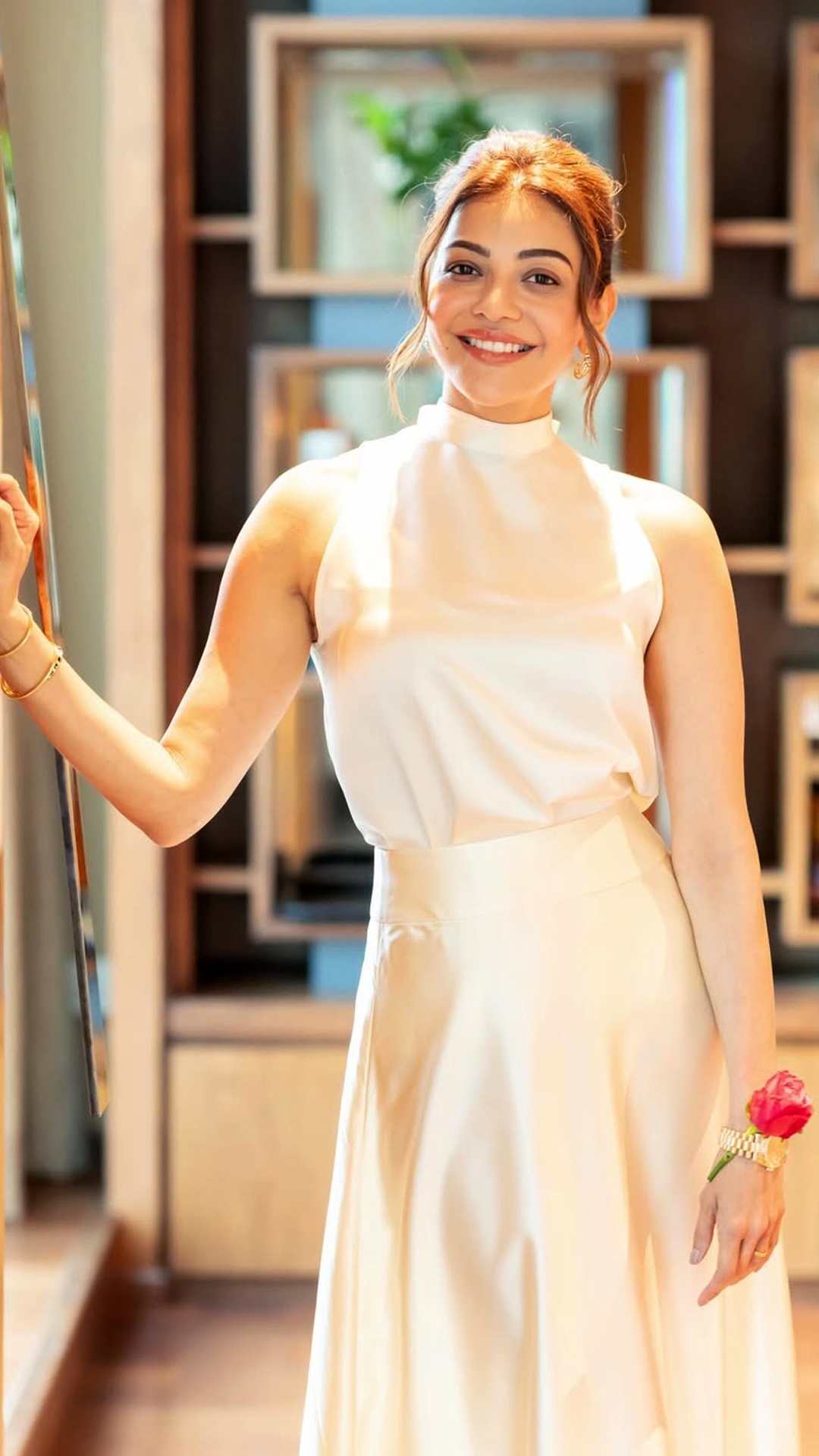 Kajal Aggarwal's Recent Photoshoot - Her makeup is beautifully understated. Defined eyeliner and mascara frame her eyes whilst nude lips and subtle highlights keep it fresh.