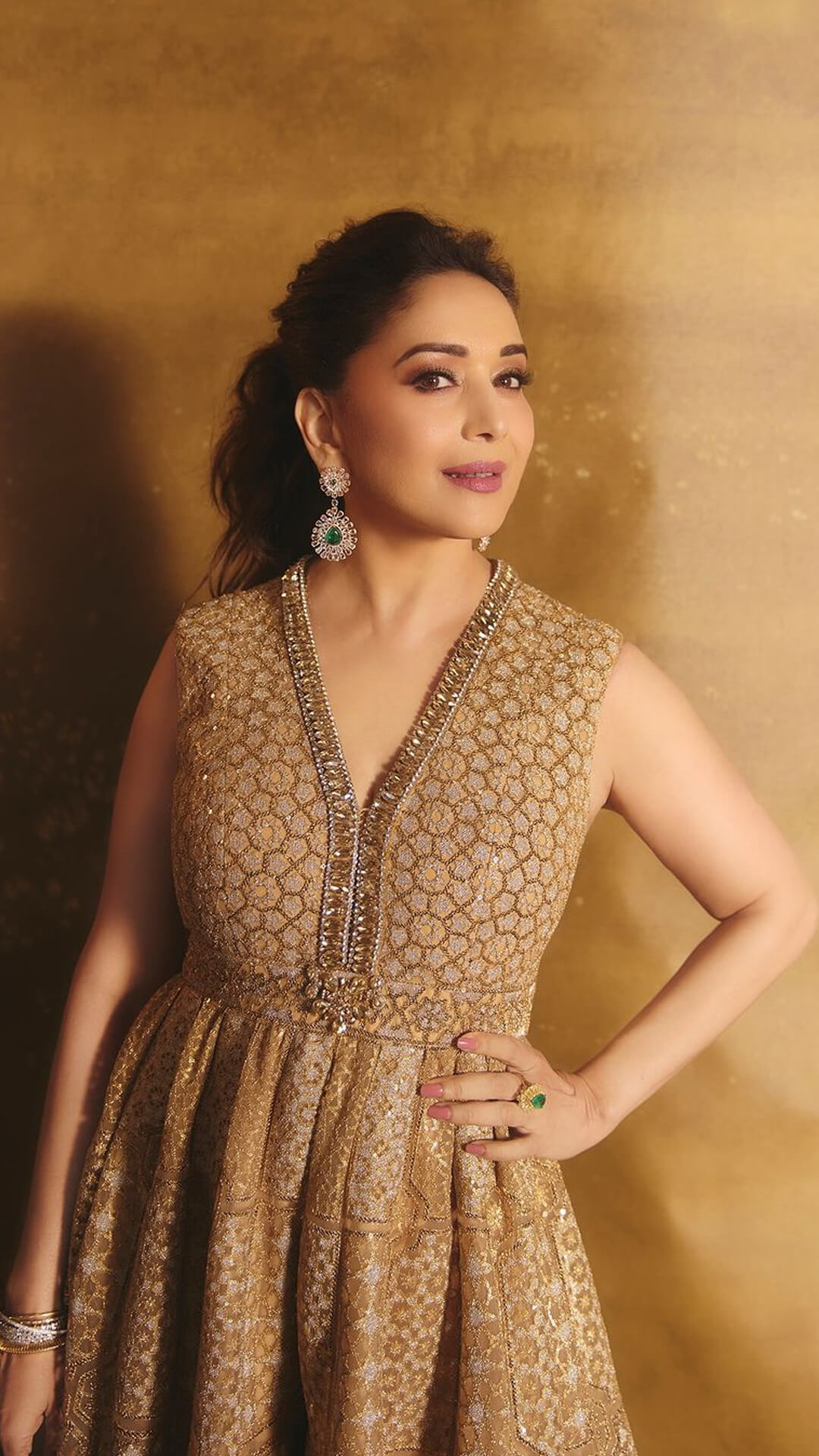 Madhuri Dixit glows in Tarun Tahiliani's Golden Designer Gown