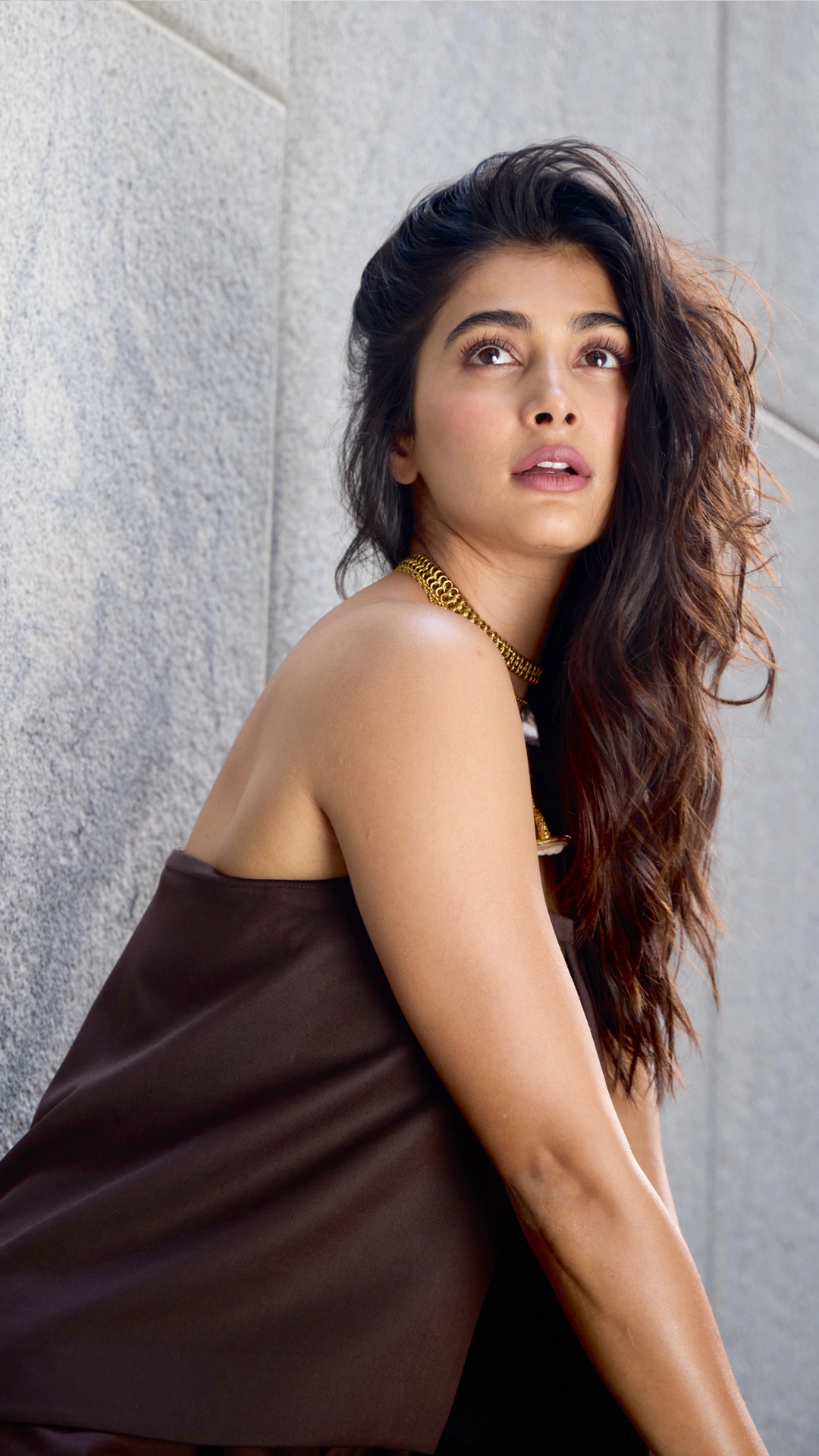 Pooja Hegde's Recent Photoshoot - Mitesh Rajani's makeup stays fresh, while Suhaas Shinde leaves the hair loose and full, which keeps the focus on the outfit's shape and jewellery.