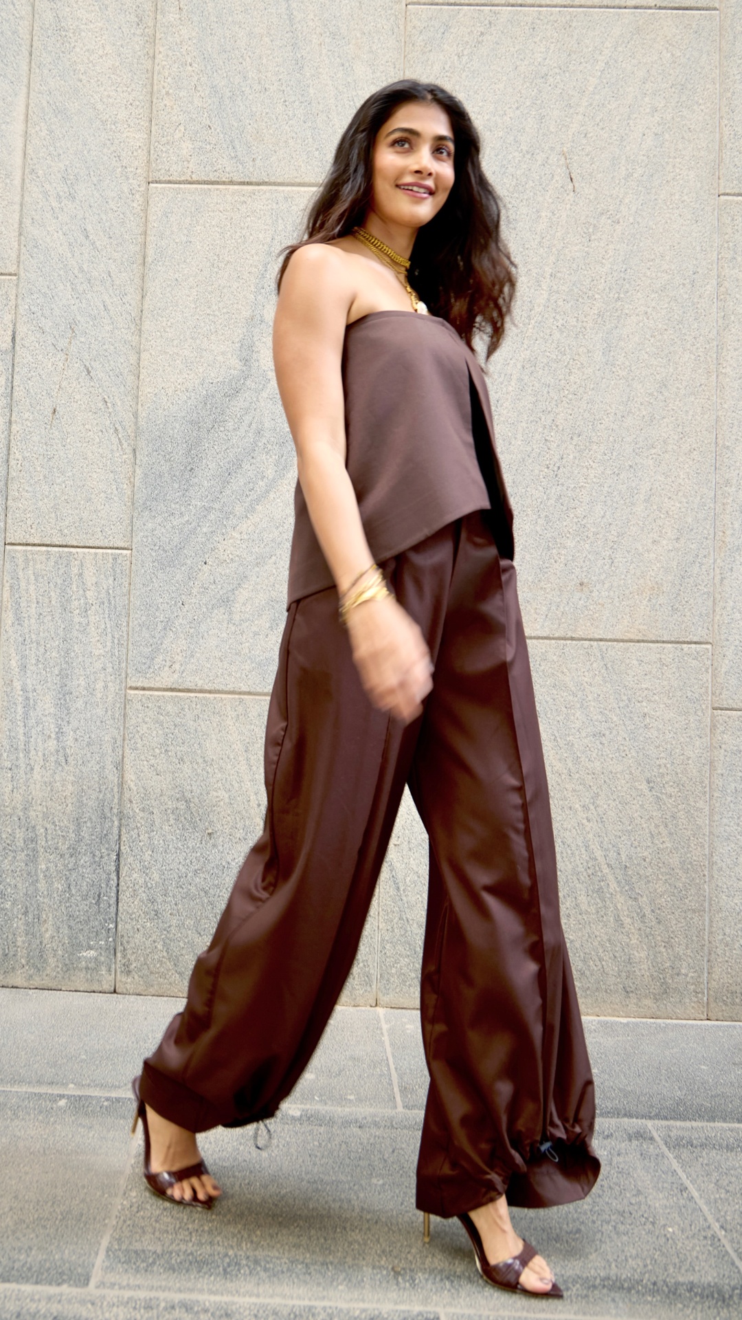 Pooja Hegde's Recent Photoshoot - The trousers fall in a long, loose line, so the volume reads relaxed rather than heavy.