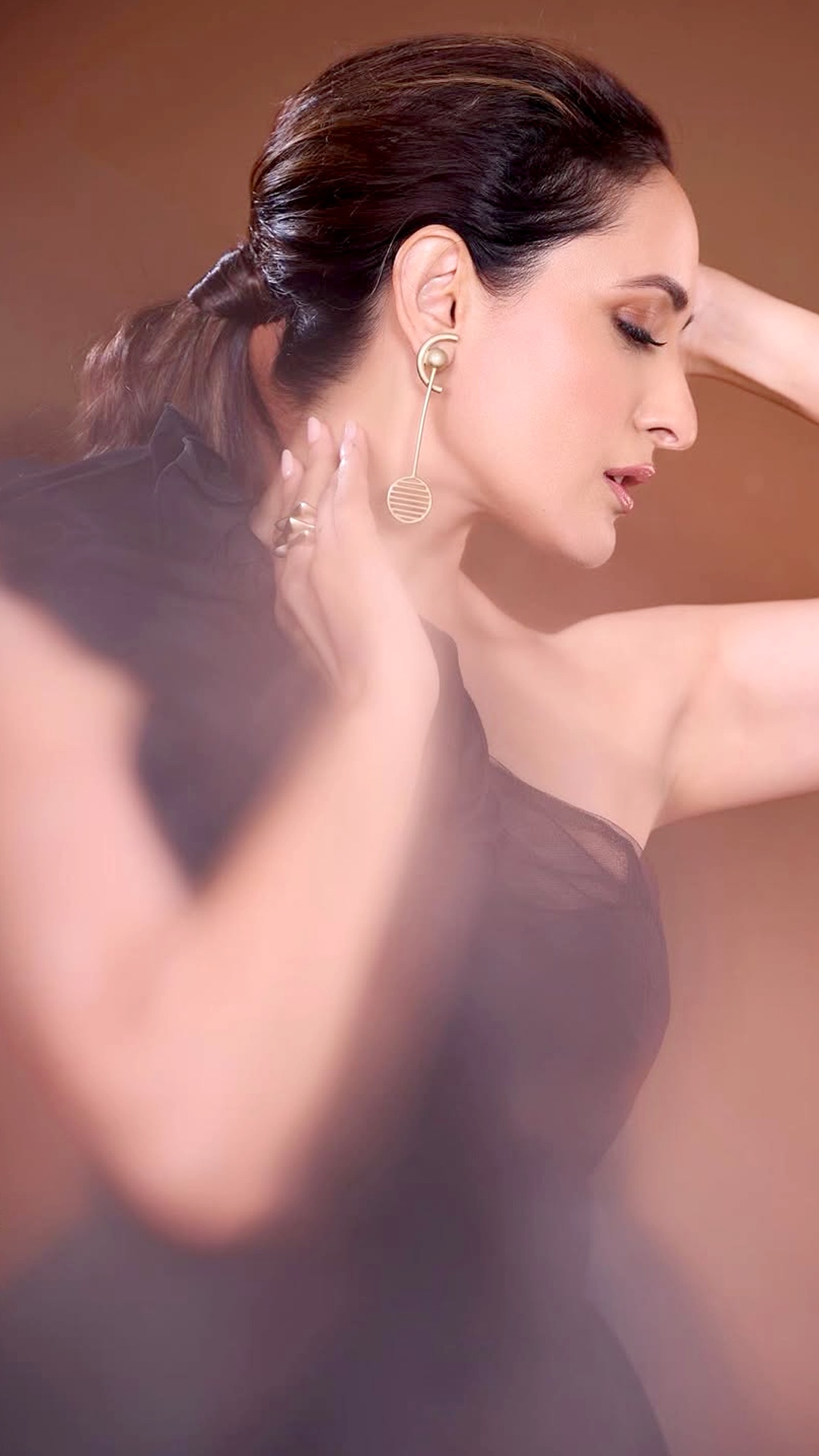 Pragya Jaiswal's Recent Photoshoot - She added some sparkle with geometric gold drop earrings by Sakshi Jhunjhunwala that look divine.