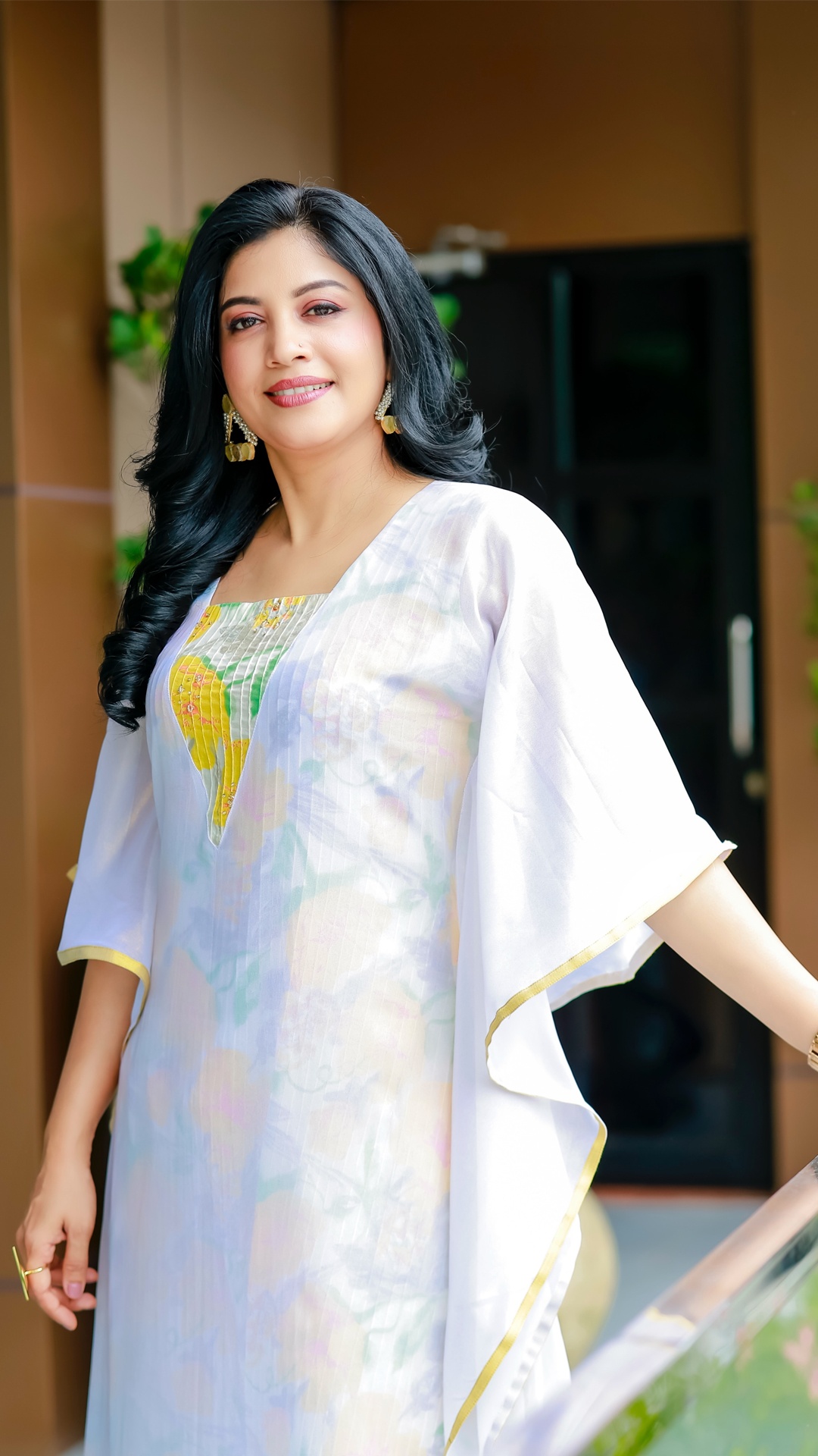 Shivada's Recent Photoshoot - The coordinating straight-fit bottoms repeat the floral print, giving the layered silhouette continuity while introducing a stronger burst of colour.