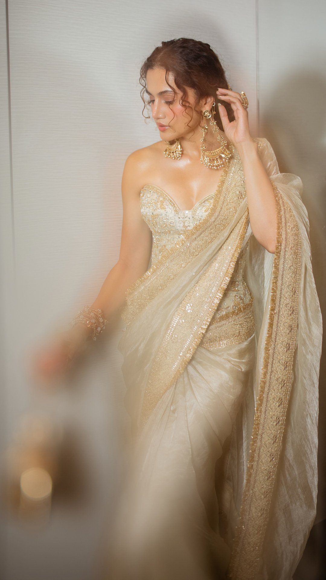 Taapsee Pannu's Recent Photoshoot - Designed by Gopi Vaid, the Zoya - Sabira Saree Set priced at Rs. 98,500/- brings dynamic sheen to contemporary celebratory occasion wear.